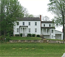 New Boston was already in decline when Daniel Hertzler built this magnificent house on the hill overlooking the town in 1854-55. The home is now part of the George Rogers Clark Park. Click for bigger picture.